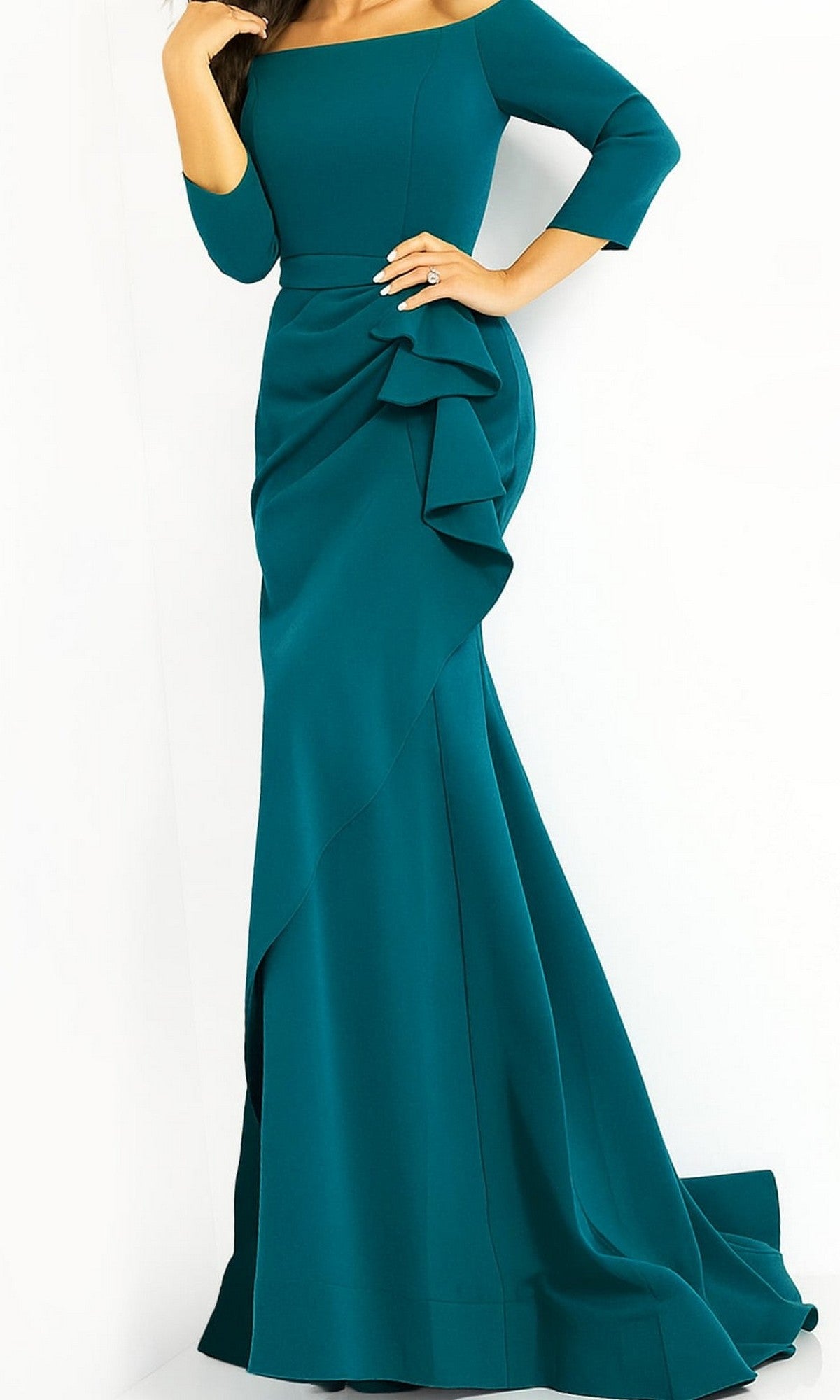 A woman wearing the Jovani Mother-of-the-Bride Long Formal Dress 00446 in teal, featuring an off-the-shoulder neckline, three-quarter sleeves, a fitted waist, a draped ruffle detail on the skirt, and a train.